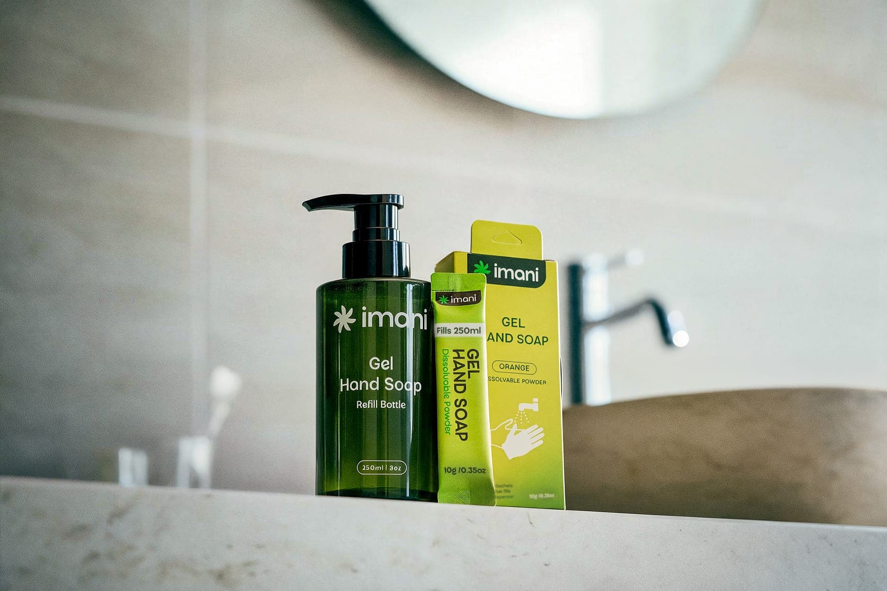 Gel bottle with pump beside a Gel Hand Soap pack