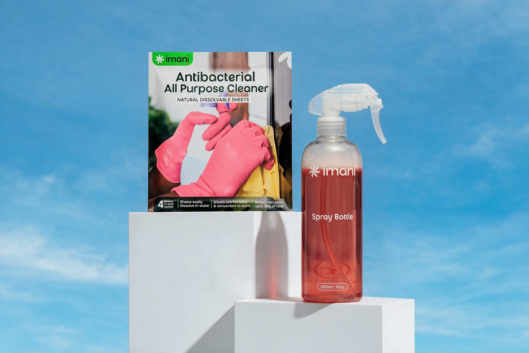 Spray bottle with nozzle beside an Antibacterial Cleaner pack